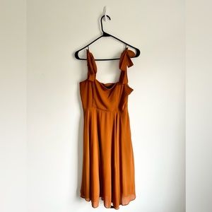 Flowy copper dress with adjustable tie straps